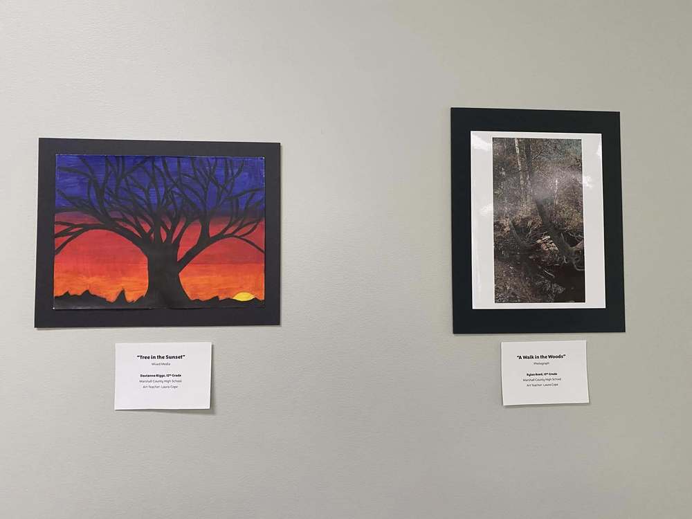 Two pieces of artwork featuring trees