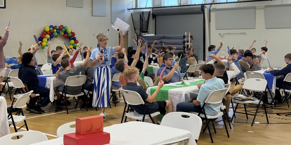 Instructor Bridget Powell speaking to Marshall Male Leadership Conference participants