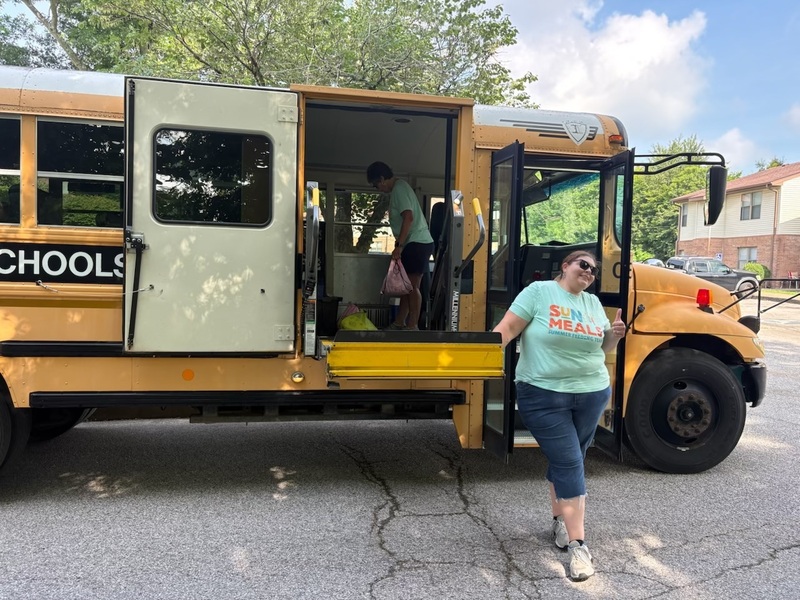Always a welcome smile outside the school bus
