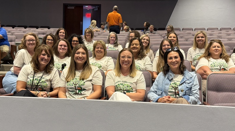 SES staff members seated in PAC
