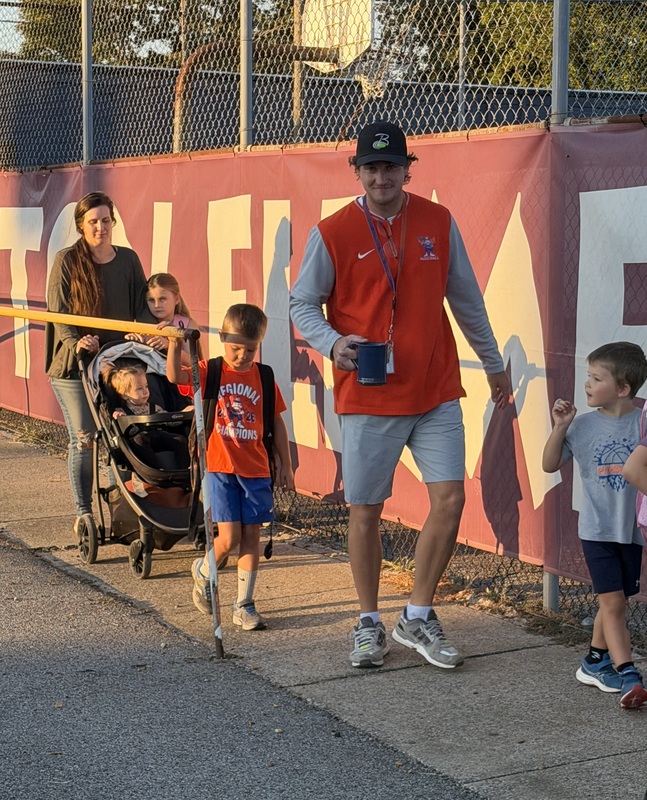 BES student approaching school while walking on International Walk to School Day