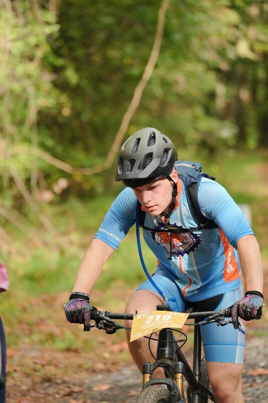 Mc Mountain bikers racing on trail
