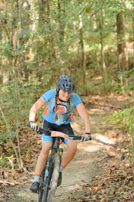 Mc Mountain bikers racing on trail
