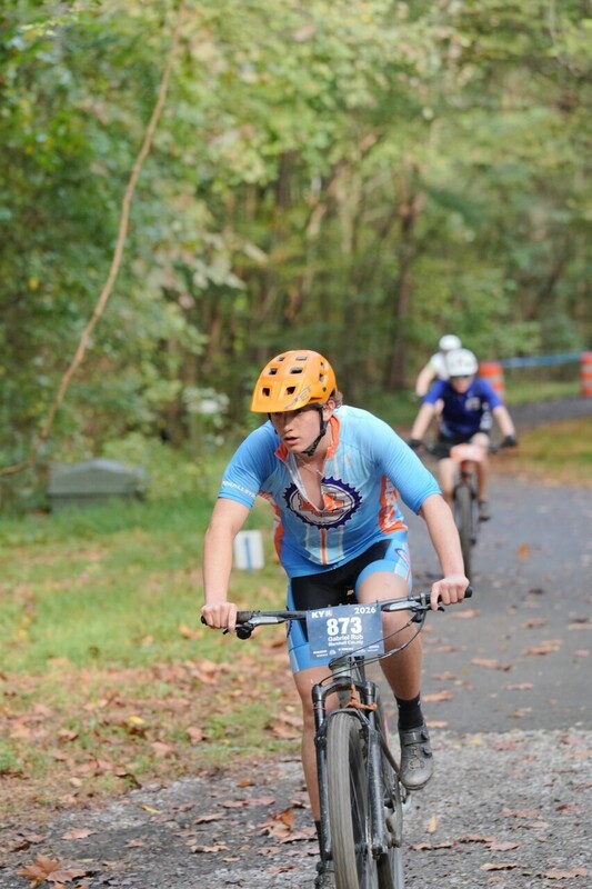 Mc Mountain bikers racing on trail