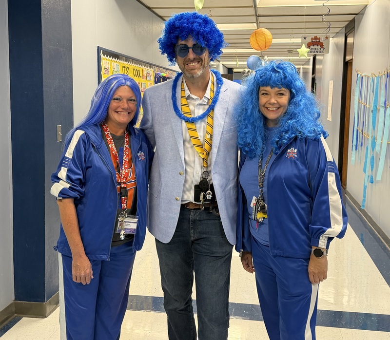 SMES staff members in blue