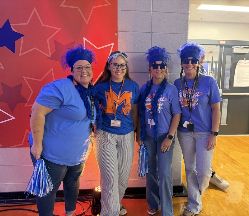 CES staff members in blue