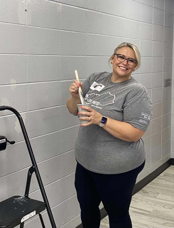 CFSB staff paint JES library