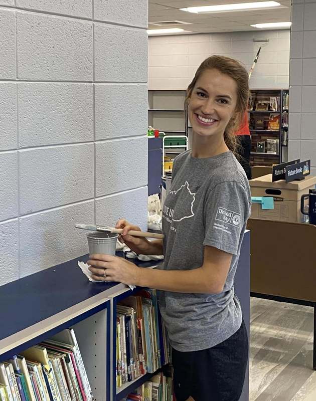 CFSB staff paint JES library