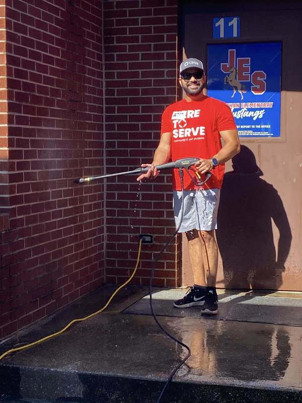 CFSB staff pressure wash at JES