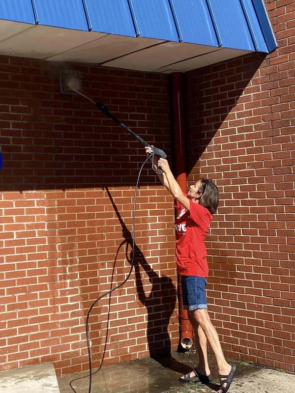 CFSB staff pressure wash at JES