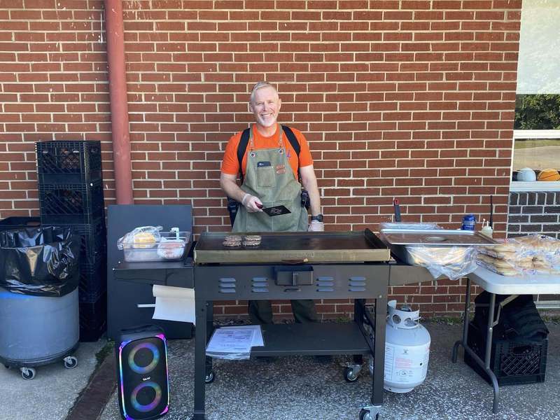 SRO grilling burgers for volunteers