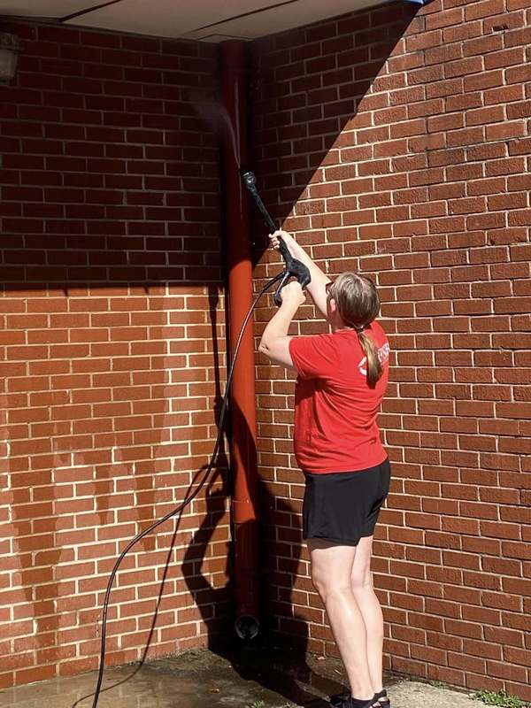 CFSB staff pressure wash at JES