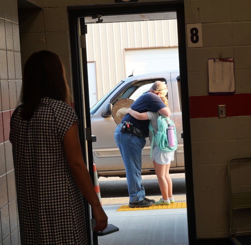 JES student greeted at school with hug