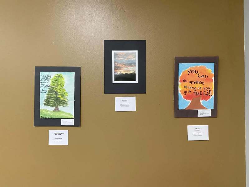 Three  pieces of artwork featuring trees