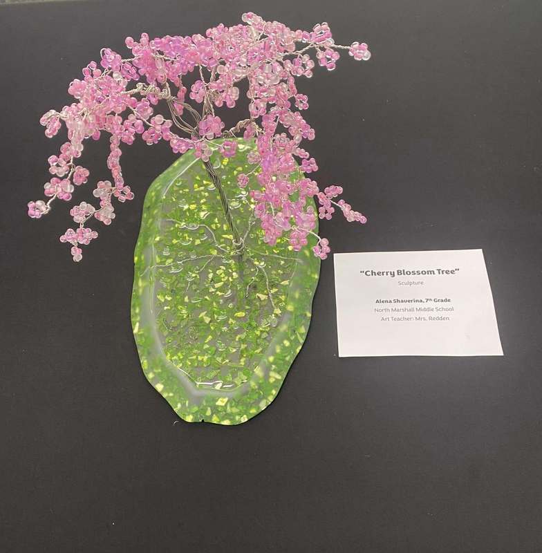 One piece of artwork featuring a tree