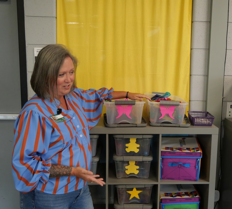 SES teacher Ashli Gore showing Picasso Tiles