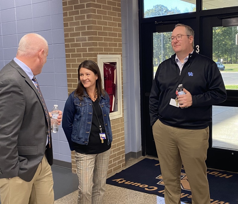 Merrick talking with staff