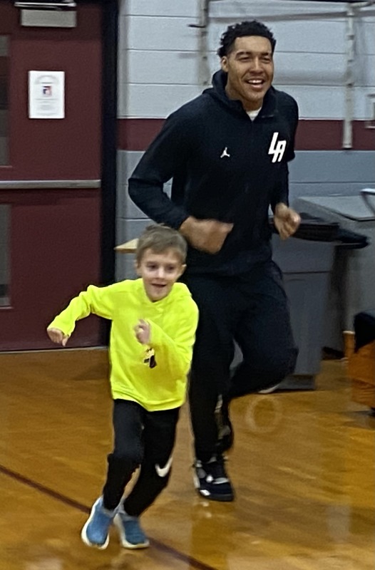 Link Academy players in BES gym with students