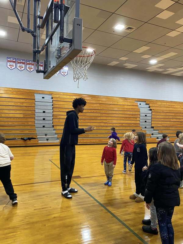 Link Academy players in BES gym with students