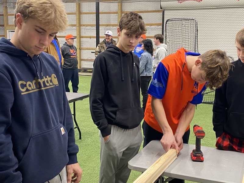 MC baseball players  building  beds 