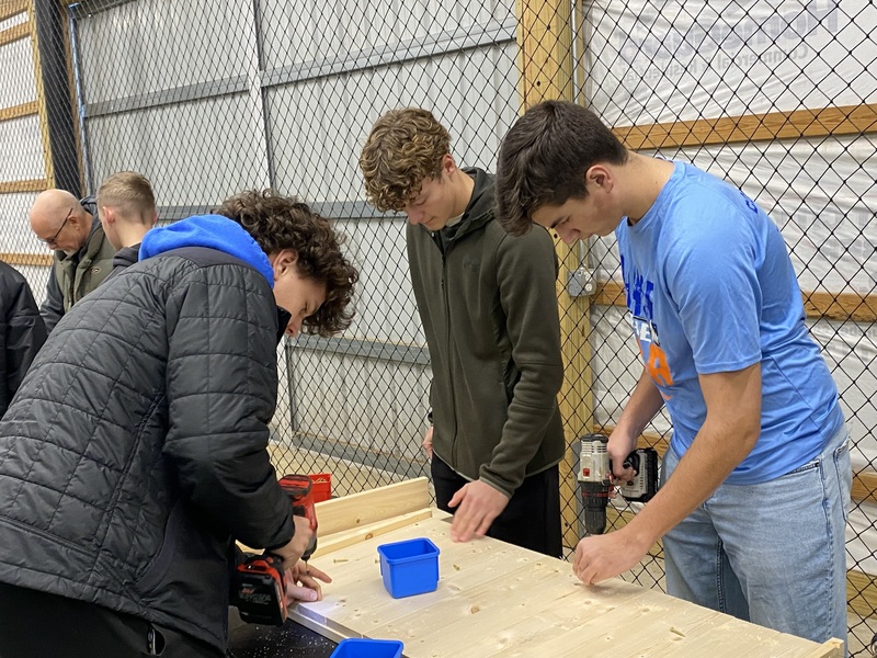 MC baseball players  building  beds 