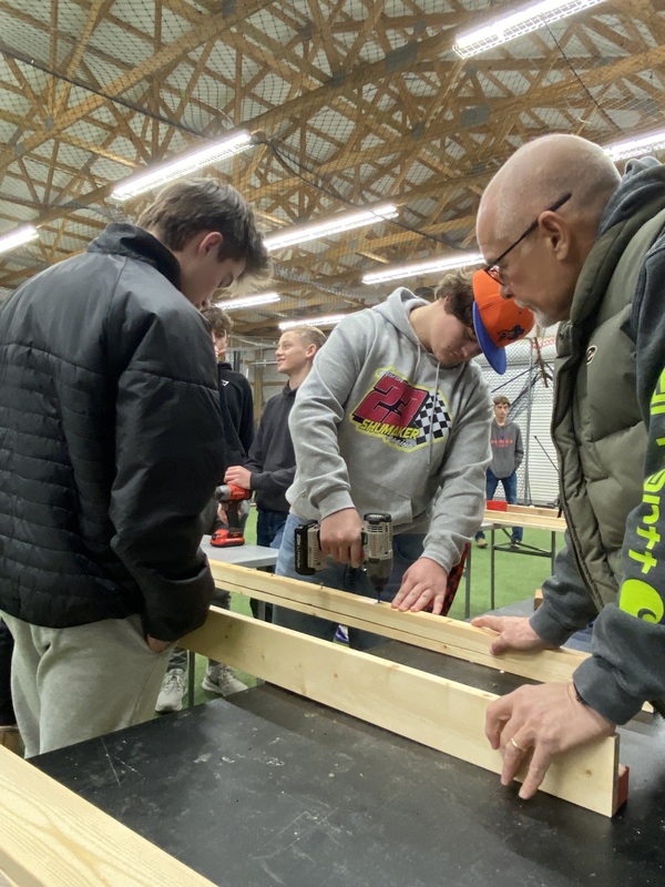 MC baseball players  building  beds 