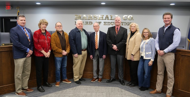 Johnson with current and former board members