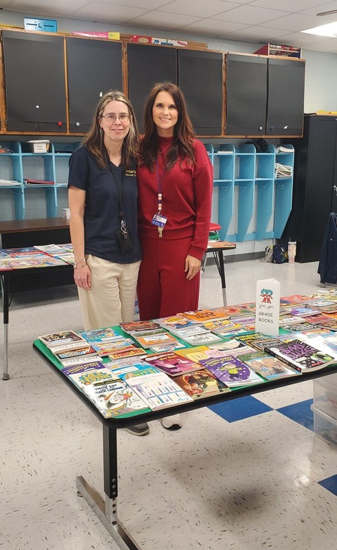 FRYSC Coordinator with books