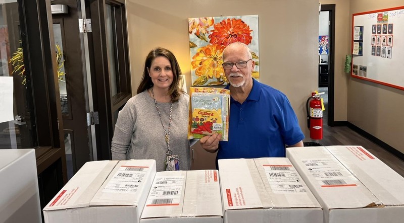 FRYSC Coordinator with books