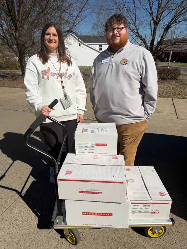 FRYSC Coordinator with books