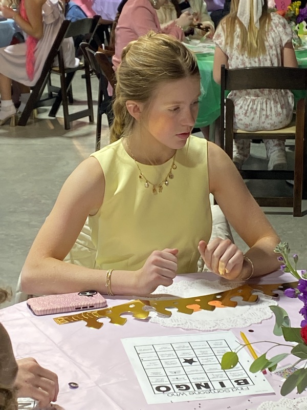 Female student working on acitivity at Leadership Forum