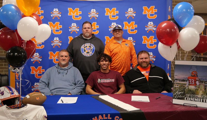 MCHS senior Kayson Holland signs to play football at Bellarmine Univ.