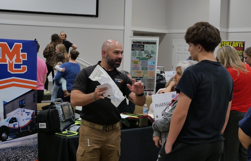 Paramedic talking to student during Truth or Consequences