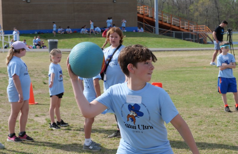 Students playing dodge ball at Team Ultra Field Day