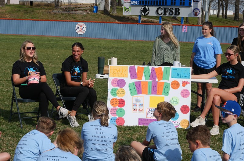 Students  at "dental hygiene" Rethink your d booth duringTeam Ultra Field Day