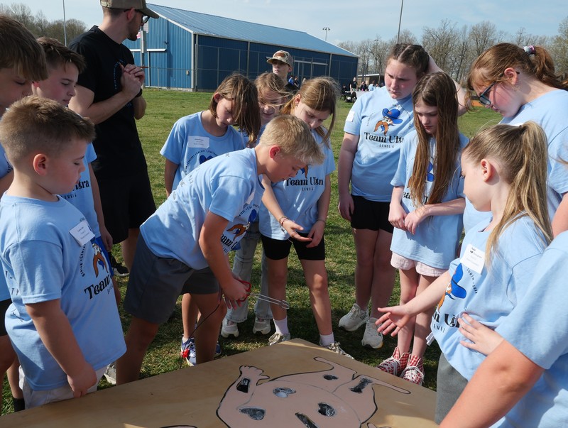 Students  at "Operation" booth learning about the anatomy duringTeam Ultra Field Day