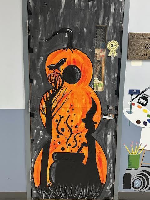 High School had a door decorating contest here are the winners of the Staff Decorated Doors: 1st place: Ms. Olson's "Teacher Graveyard", 2nd place: Mrs. Grandstrand's "The Great Pumpkin" , 3rd place: Mrs. Donarski's "rival of a Picasso" Congratulations!