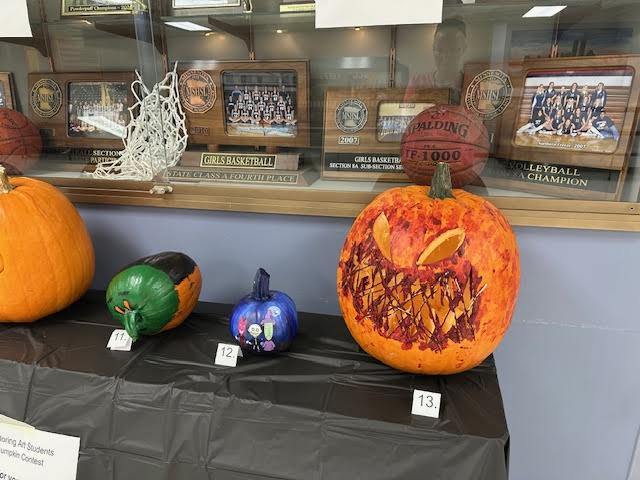 Mrs. Donarski's Exploring Art Students had a Pumpkin Contest - Students voted for their favorite pumpkin. Congratulations to 1st place Kira Perkins which was pumpkin #3 and in close second place - Shelby Williams pumpkin #13. Congratulations and well done students!
