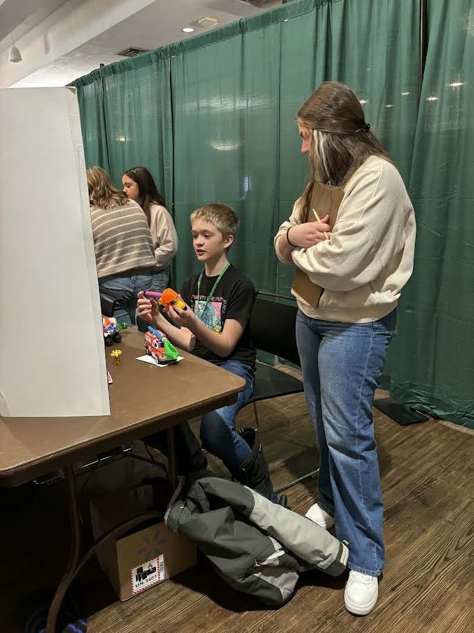 Here are a couple of pictures of our 6th graders at the Regional Science Fair today (2/20) - Congratulations and Good Luck students!