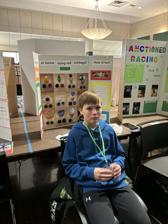 Here are a couple of pictures of our 6th graders at the Regional Science Fair today (2/20) - Congratulations and Good Luck students!