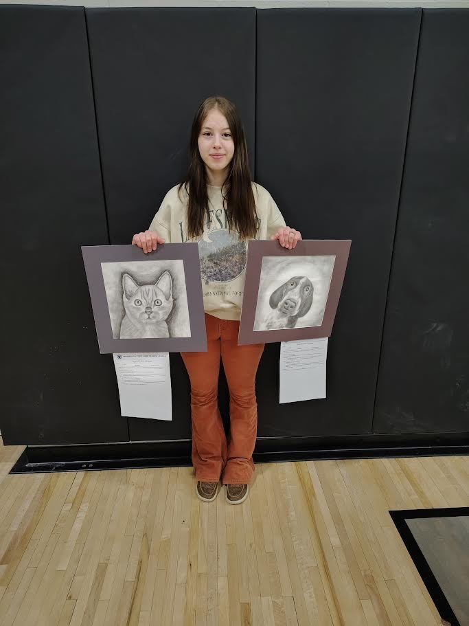 Last week Keziah Momerak and Arianna Accurso attended the Section 8A Art Festival held in Warroad. Keziah received an Excellent rating for her drawing Bailey. Thank you Keziah for sharing your art!