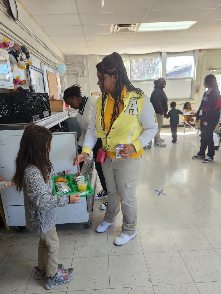 Ed prep students assisting with lunch duty
