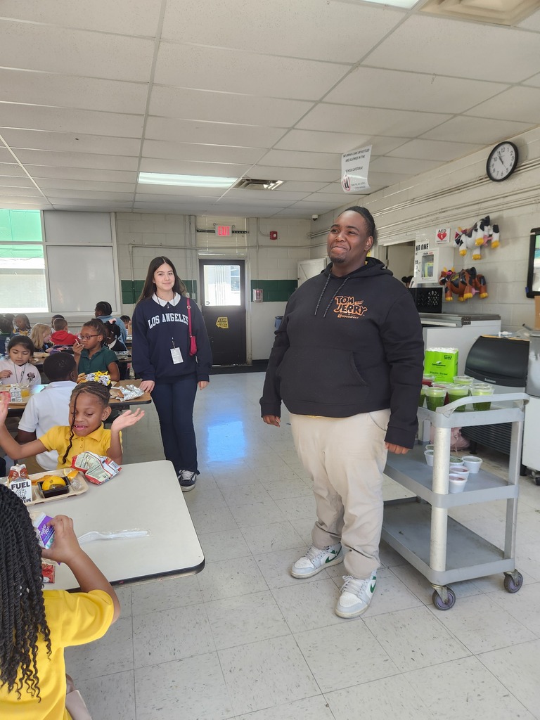Ed Prep students on lunch duty on their field experience in an elementary school
