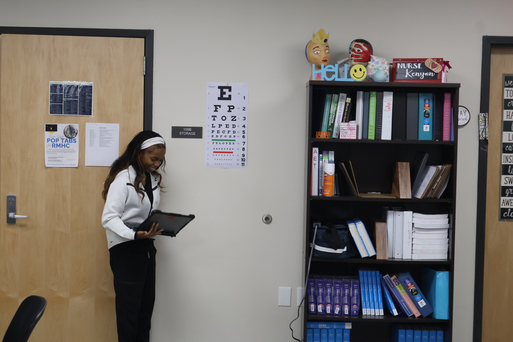 Student conducting a vision screening