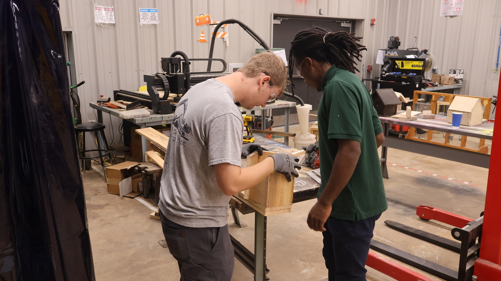 Advanced Manufacturing Student making a bird house