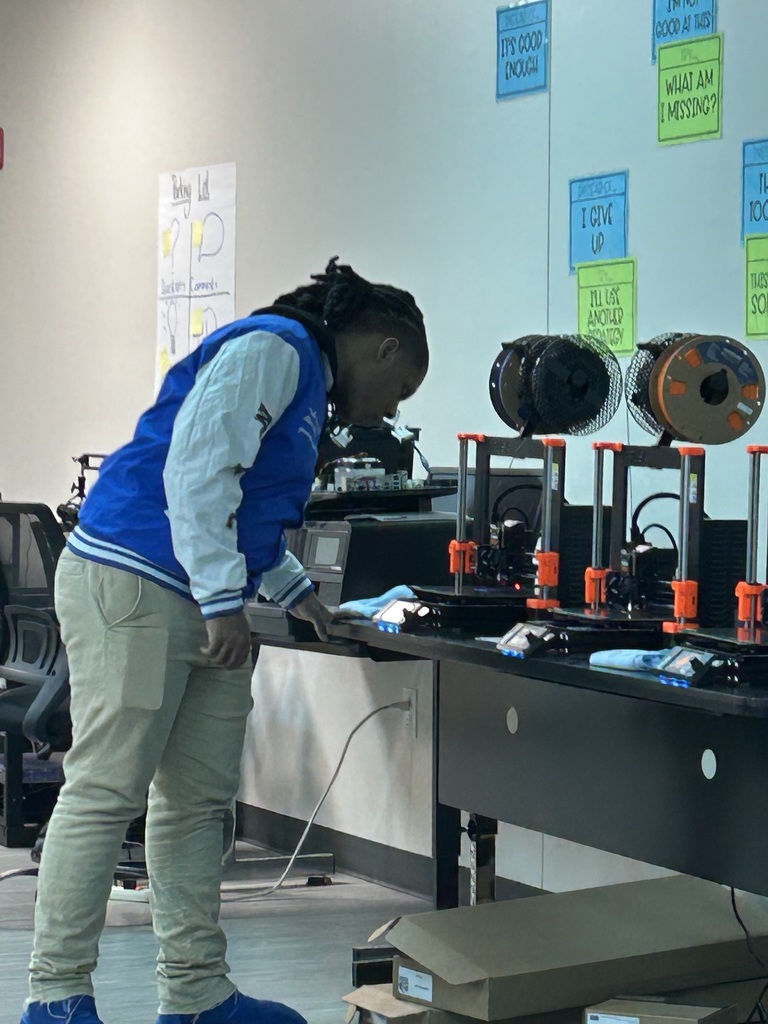 Student managing 3D Printer