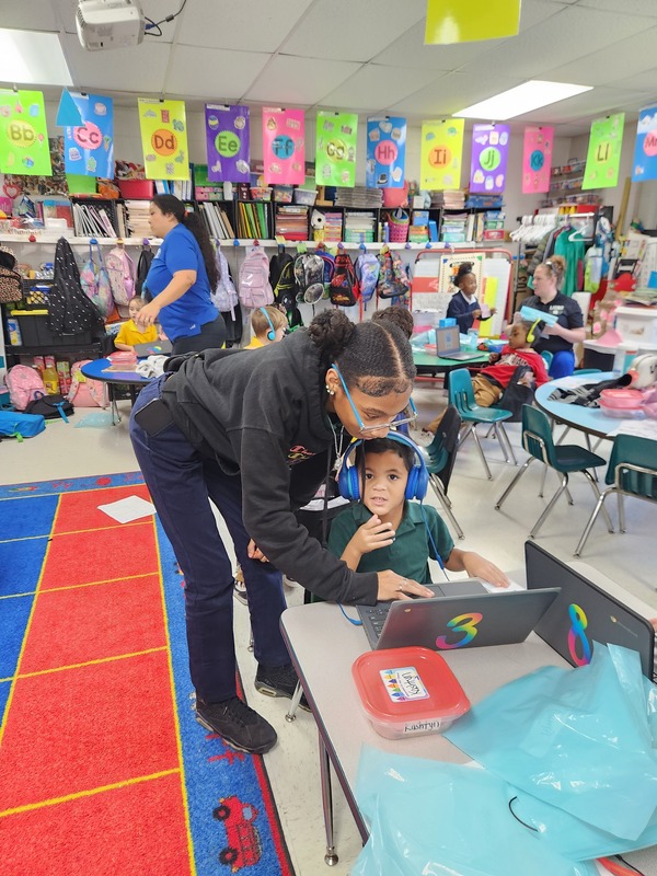 Ed Prep student working with students in  field experience