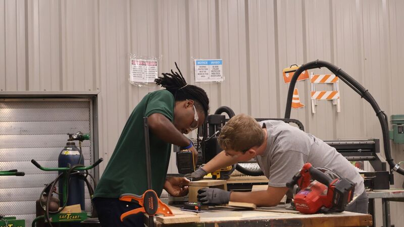 Advanced Manufacturing student practicing with hand tools