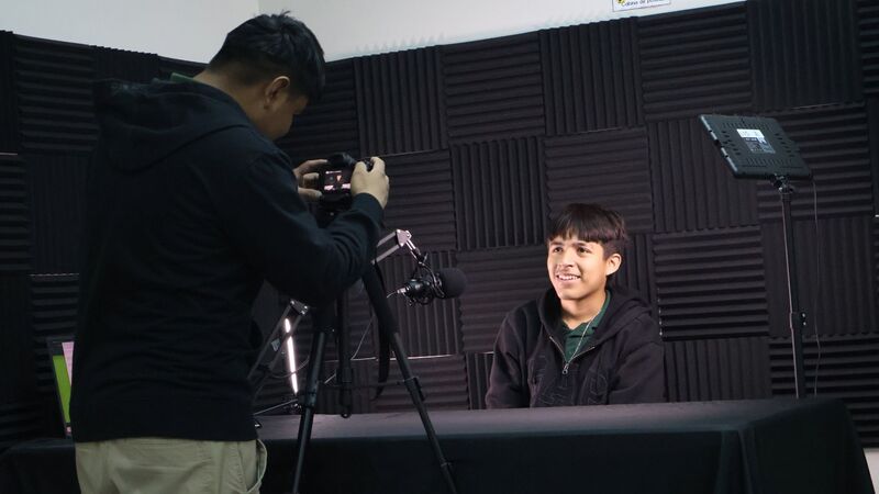 Multimedia students conducting an interview.