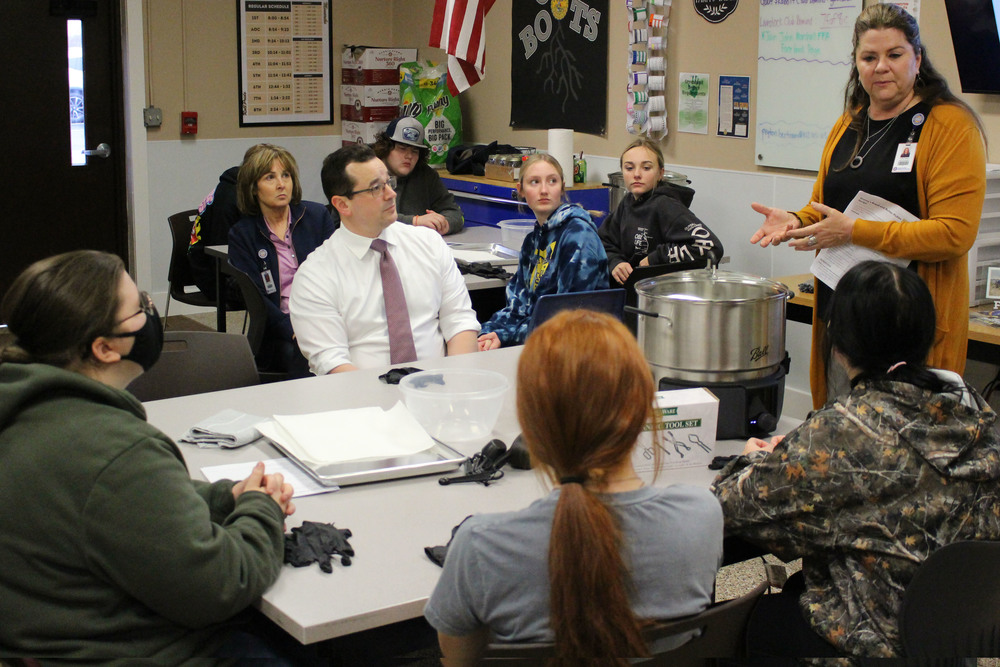 Students learning how to make make homemade bread and butter-style pickles and can them.